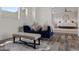 Elegant living room with hardwood floors, a plush rug, and comfortable seating at 631 Coriander Canyon Ct, Las Vegas, NV 89138
