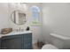 Charming powder room with unique vanity and stylish fixtures at 631 Coriander Canyon Ct, Las Vegas, NV 89138