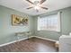 Bedroom features a painting and natural light at 6508 Bourbon Way, Las Vegas, NV 89107