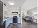 Kitchen flows into living room with lots of bright light and open space at 6508 Bourbon Way, Las Vegas, NV 89107