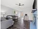 Inviting living room with modern furniture, ceiling fan, and decorative fireplace at 6508 Bourbon Way, Las Vegas, NV 89107