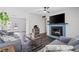 Comfortable living room with a fireplace and view of back yard, perfect for Gathering gatherings at 6508 Bourbon Way, Las Vegas, NV 89107