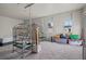Spacious room with multiple windows, carpeted floors, and ample natural light at 6508 Bourbon Way, Las Vegas, NV 89107