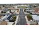 Aerial view of the neighborhood showcasing houses and a nearby school at 6508 Bourbon Way, Las Vegas, NV 89107