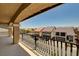 Second-story balcony overlooking a residential neighborhood with well-maintained homes and landscaping at 6516 Austin Hope Ave, Las Vegas, NV 89118