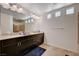 Bathroom features double vanity, large mirror, and natural light at 6516 Austin Hope Ave, Las Vegas, NV 89118