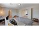 Bright bedroom features natural light, gray carpet, and closet access at 6516 Austin Hope Ave, Las Vegas, NV 89118