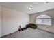 Bright bonus room features gray carpet and natural light from the window at 6516 Austin Hope Ave, Las Vegas, NV 89118