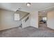 Hallway and bonus room features neutral colors and gray carpet at 6516 Austin Hope Ave, Las Vegas, NV 89118