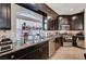 This is a spacious kitchen with a granite countertop and stainless steel appliances at 6516 Austin Hope Ave, Las Vegas, NV 89118