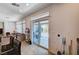 View of living room with tile floors and sliding doors to the backyard patio at 6516 Austin Hope Ave, Las Vegas, NV 89118