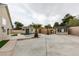 Wide angle of backyard showing the in-ground pool, modern shed, and hardscape at 6549 Gazelle Dr, Las Vegas, NV 89108