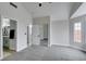 Bedroom with vaulted ceiling, ceiling fan, carpeted floor, and view into bathroom at 6549 Gazelle Dr, Las Vegas, NV 89108