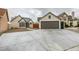 Home exterior showing a large driveway leading to the two-car garage at 6549 Gazelle Dr, Las Vegas, NV 89108