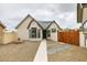 Charming home exterior with desert landscaping, solar panels, and sidewalk at 6549 Gazelle Dr, Las Vegas, NV 89108