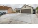 Home exterior showing a large driveway leading to the two-car garage at 6549 Gazelle Dr, Las Vegas, NV 89108