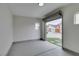 Interior of garage with view to backyard, pool and grass at 6549 Gazelle Dr, Las Vegas, NV 89108