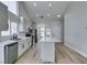 Bright kitchen features an island, stainless steel appliances, and light wood floors at 6549 Gazelle Dr, Las Vegas, NV 89108