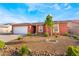 Charming single-story home with desert landscaping and a spacious two-car garage at 6661 Gallup Ct, Pahrump, NV 89060