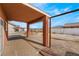 A covered patio features paver flooring, providing an inviting outdoor space with desert landscape views at 6661 Gallup Ct, Pahrump, NV 89060