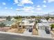 A unique two-story home with a front yard and convenient private driveway in a residential area at 816 Antigua St, Las Vegas, NV 89145