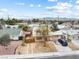 Residential area showcasing a unique two-story home with front yard and a private driveway at 816 Antigua St, Las Vegas, NV 89145