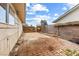 Cozy backyard with a brick patio, wooden fence, and exterior wall at 816 Antigua St, Las Vegas, NV 89145