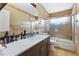 The bathroom features a tiled shower with a glass door and single sink vanity at 816 Antigua St, Las Vegas, NV 89145