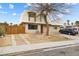 Charming two-story home featuring a unique roofline and private driveway at 816 Antigua St, Las Vegas, NV 89145