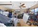 The spacious garage has overhead lighting, a ceiling fan, and built-in shelving at 816 Antigua St, Las Vegas, NV 89145