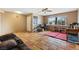 Living room with tile flooring, a front door, and a comfortable sofa at 816 Antigua St, Las Vegas, NV 89145