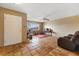 Living room with tile flooring, a front door, and a cozy chair at 816 Antigua St, Las Vegas, NV 89145