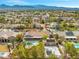 Beautiful suburban home with a private pool, sport court, and desert landscaping at 8220 Tursi Lodge Ct, Las Vegas, NV 89131