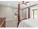 The main bedroom offers a view of the ensuite bathroom and access to the backyard at 8220 Tursi Lodge Ct, Las Vegas, NV 89131