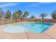 Backyard pool with steps and desert landscaping at 8220 Tursi Lodge Ct, Las Vegas, NV 89131