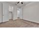 A bright bedroom with carpet, neutral walls, and walk-in closet, offering a comfortable retreat at 8393 Canyon Crevasse St, Las Vegas, NV 89166