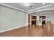 Bright, open living area with hardwood floors leading to the kitchen at 8393 Canyon Crevasse St, Las Vegas, NV 89166