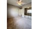 Bedroom with sliding mirror closet and carpet floor at 8501 W University Ave # 1128, Las Vegas, NV 89147