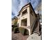 Condo exterior shows a two story building, stairs, walkway, and partial view of the community at 8501 W University Ave # 1128, Las Vegas, NV 89147