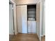 Convenient laundry closet with bi-fold doors and a washer inside at 8501 W University Ave # 1128, Las Vegas, NV 89147