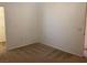 Neutral bedroom with carpet and access to a walk-in closet at 8555 W Russell Rd # 1078, Las Vegas, NV 89113