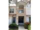 Charming townhome showcasing a private balcony, neutral stucco, and a red tile roof at 8555 W Russell Rd # 1078, Las Vegas, NV 89113