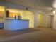 Open living and kitchen area with a modern aesthetic and ample space for relaxing and dining at 8555 W Russell Rd # 1078, Las Vegas, NV 89113