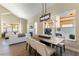 Spacious open floor plan with dining area and living room in natural light at 8816 Saint Pierre Dr, Las Vegas, NV 89134