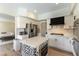 Modern kitchen features stainless steel appliances and custom black-and-white patterned island at 8816 Saint Pierre Dr, Las Vegas, NV 89134