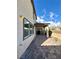 Private backyard featuring a paver patio, low-maintenance landscaping, and a covered patio at 9136 Cocowoods Pl, Las Vegas, NV 89148
