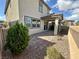 Private backyard featuring a paver patio, low-maintenance landscaping, and a covered patio at 9136 Cocowoods Pl, Las Vegas, NV 89148
