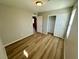 Spacious bedroom with closet and laminate flooring at 9136 Cocowoods Pl, Las Vegas, NV 89148