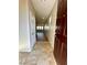 Inviting entryway with tile flooring, leading to an open-concept living area at 9136 Cocowoods Pl, Las Vegas, NV 89148