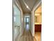Hallway showing access to a bathroom and bedroom at 9136 Cocowoods Pl, Las Vegas, NV 89148
